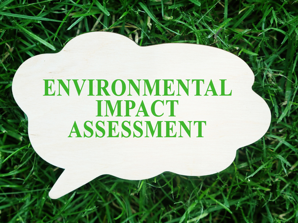 White plate with words Environmental impact assessment EIA.