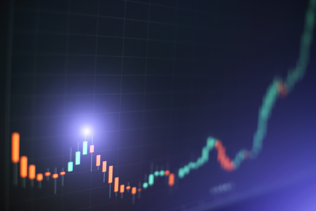 Technical Price Graph and Indicator, Red and Green Candlestick Chart on Blue Theme Screen, Market Volatility, up and down Trend. Stock Trading, Crypto Currency Background.